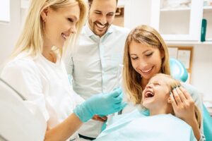 Young family at dentist